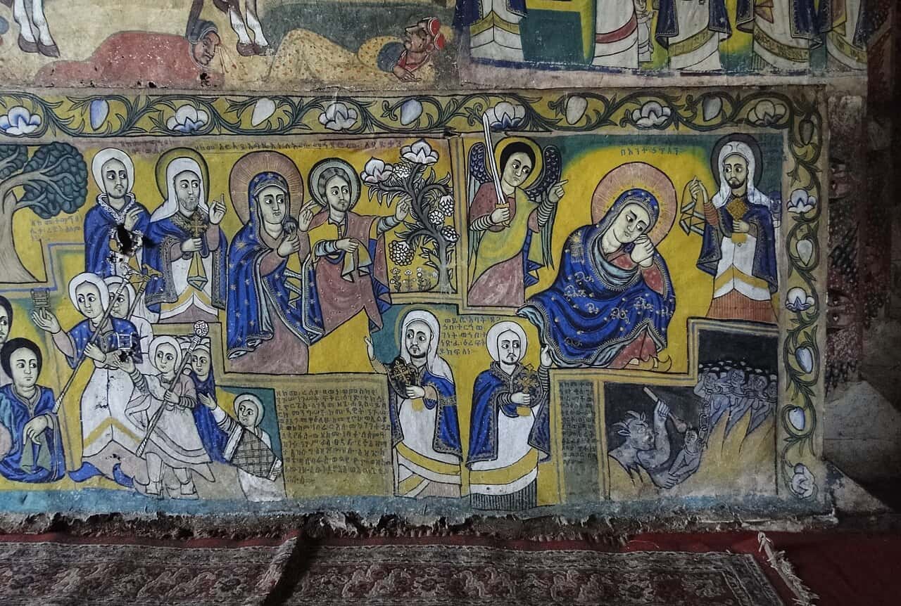 Colourful religious paintings of the Virgin Mary and saints inside Ura Kidane Mehret church